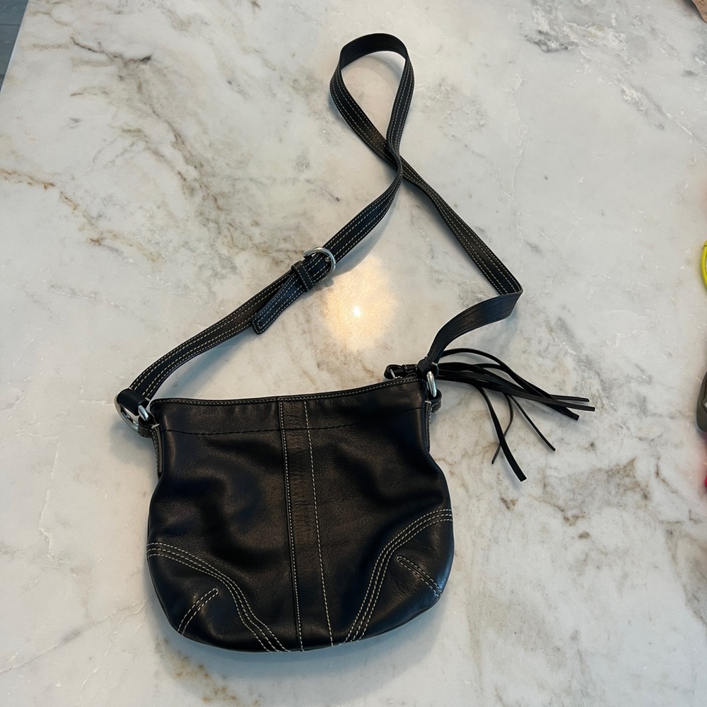 Black coach adjustable crossbody bag. EUC